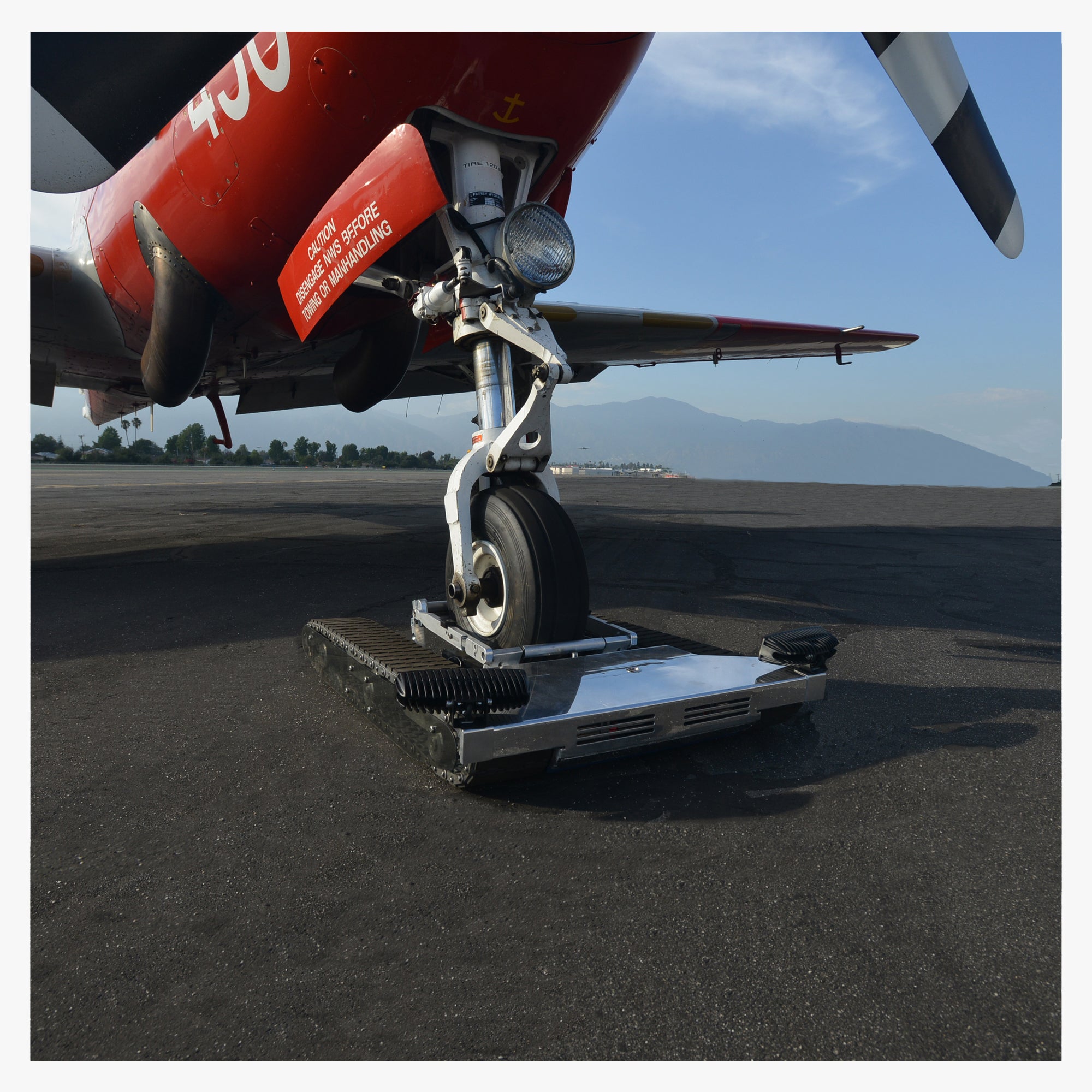 Remote tug for airplane